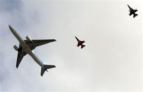 Fighter jet escorting airliner Nov
